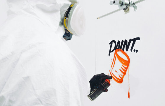 Street Artist Working In Studio On Typography And Graffiti Illustrations