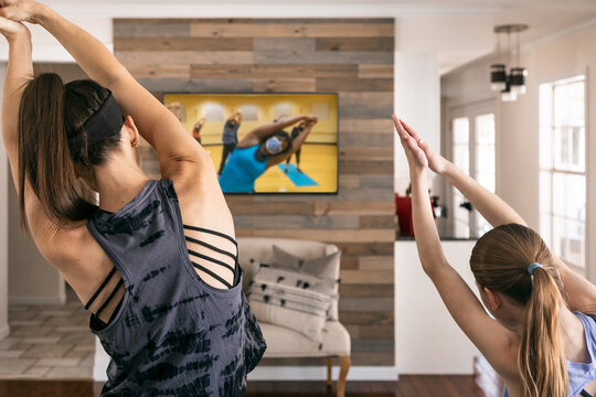 Home: Family Stretching Along With Virtual Class