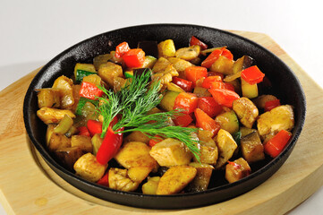 meat stewserver in pan with potato and carrot