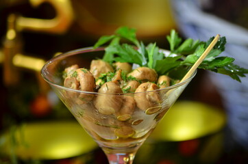 Small conserved mushrooms served with persil leaf Russian national food