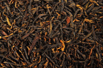 red chinese dian hun tea. Texture background macro photo.