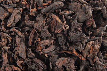 puer tea. Texture background macro photo.