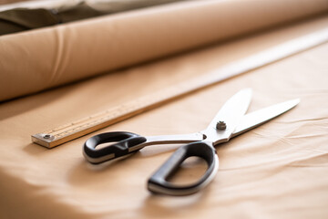 Desk with tools indoors of a tailor's atelier
