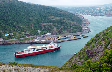 A cargo ship entering St. John's Newfoundland harbour via the Narrows