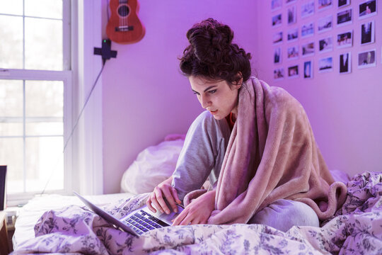 college student working on laptop 