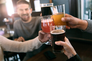 Brewery: Group Of Friends Celebrate By Raising A Glass