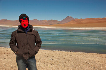 man wearing a devil-faced balaclava