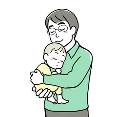 A smiling father holding his sleeping baby in his arms