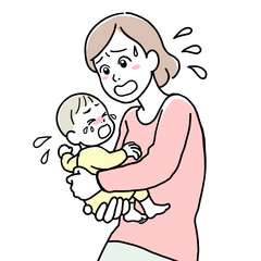 A mother holding her crying baby in her arms