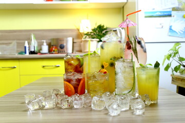 homemade cocktail on the wooden table closeup on kitchen blurred background