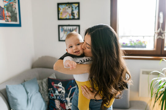 Family lifestyle, young millennial parents spending free time with their baby