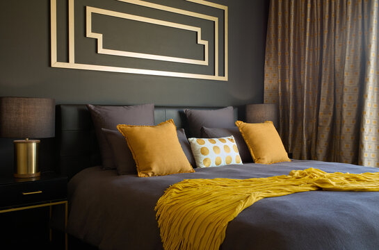 Styled Gold and Black bedroom interior