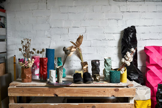 Luminous craft workshop with examples of handmade work