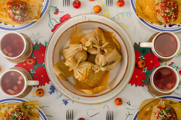 Traditional Guatemalan table served with chuchitos, fruit punch at Christmas.