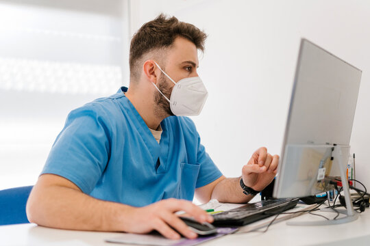 Veterinarian working with a computer