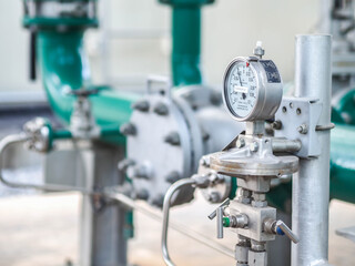 Pressure gauge of measuring instrument close up in industry zone at power plant with closed up