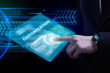 Business, Technology, Internet and network concept. Young businessman working on a virtual screen of the future and sees the inscription: Customization