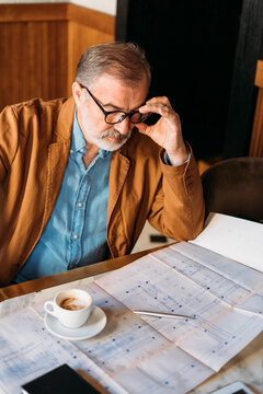 Businessman Working in Cafe