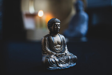 Buddha statue on black background 