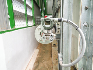 Level transmitter by pressure transmitter type was installed in power plant for monitor and control level tank.
