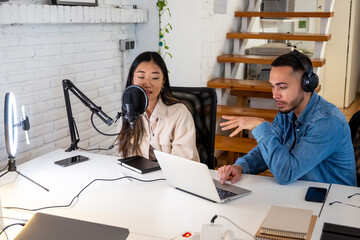 Diverse colleagues recording an online podcast