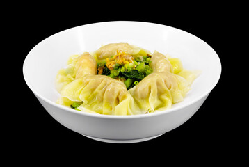 Pork wontons isolated on black background.Chinese cuisine