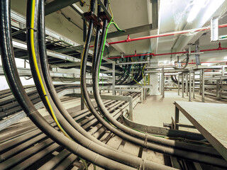 Power cables and instrument cables were installed with cable trays in electric cable room of power...