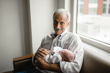 Grandfather Holds Grandson