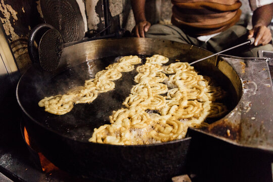Street food fries in a vat in India