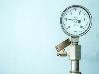 Pressure gauge of measuring instrument close up in industry zone at power plant with closed up