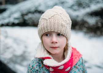 Portrait of a young girl in winter clothes