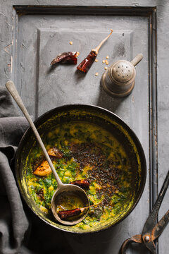 Indian spinach dal bowl on a dining table