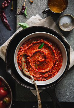 Hot and Spicy Tomato curry on a dark background
