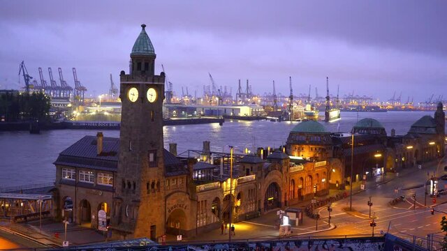 Famous St Pauli Landungsbruecken at the port of Hamburg - amazing evening view - travel photography