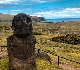 The one and only Easter Island's Moai Statue that is kneeling and has beard on a sunny day