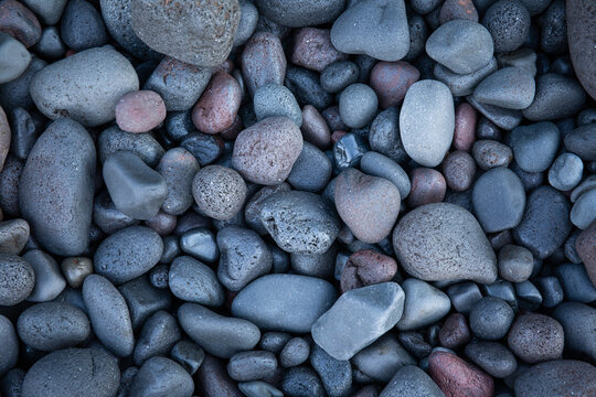 Smooth rocks on the beach. Amed. Bali.  Indonesia.