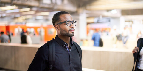 Black man: subway business man commuting