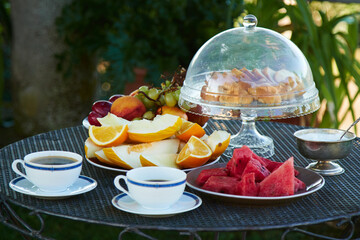 cute healthy breakfast with fruits and beautiful dishes