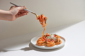 spaghetti with tomato sauce with fork