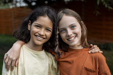 Portrait of a two cute girls outdoors