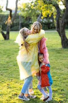 sisters hugging and having fun in the park