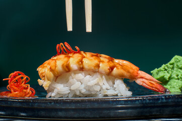 asian food modern Japanese sushi with Indian shrimp wasabi nikiri rice
