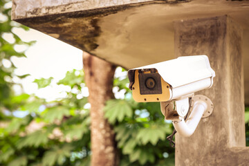 IP wireless CCTV camera installing security equipment water proof cover to protect camera with home security system concept.