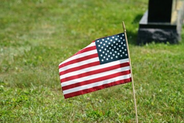 american flag on the grass