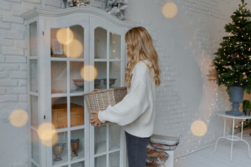 beautiful woman smiling celebrating in a dress at home for Christmas holiday new year mood 