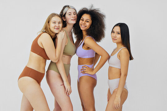 multi-ethnic female models in lingerie posing