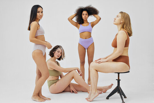 women of different ethnicities in colored lingerie