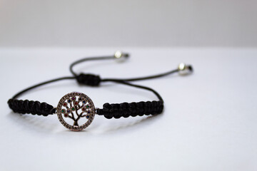 Beautiful bracelet with a tree pendant. Bracelet of black thread. Black bracelet. Women accessories.