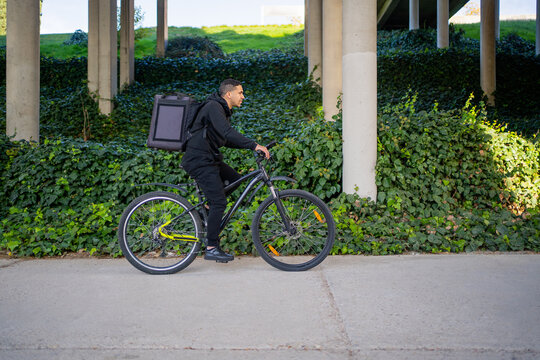 Courier With Bike Delivering Food. 