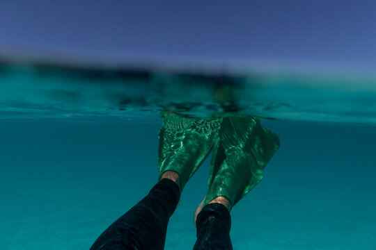 Swimming in clear blue 